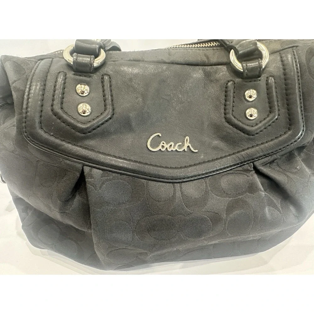 Coach black signature